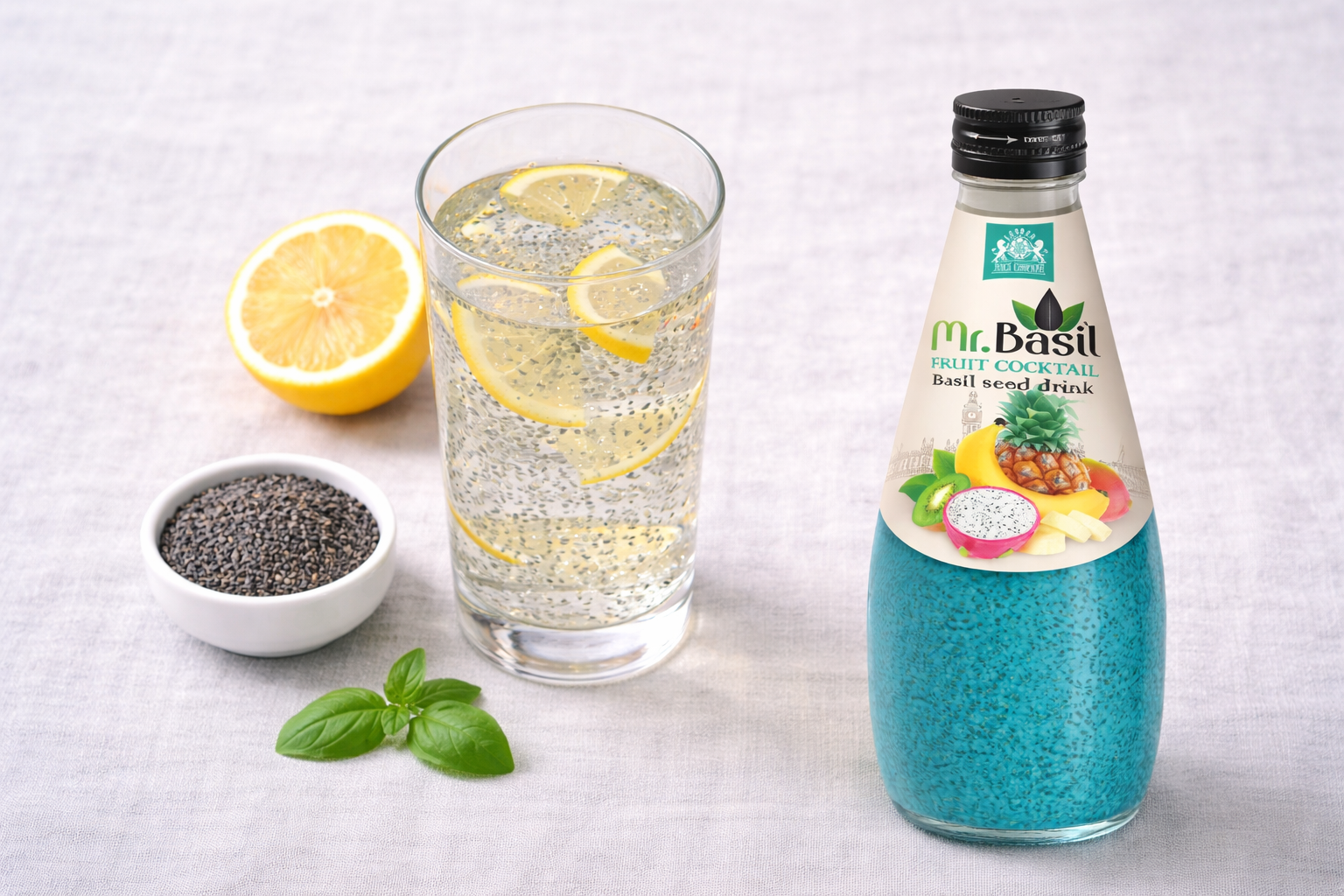 Soaked basil seeds in water alongside fresh lemon representing hydration and digestion benefits