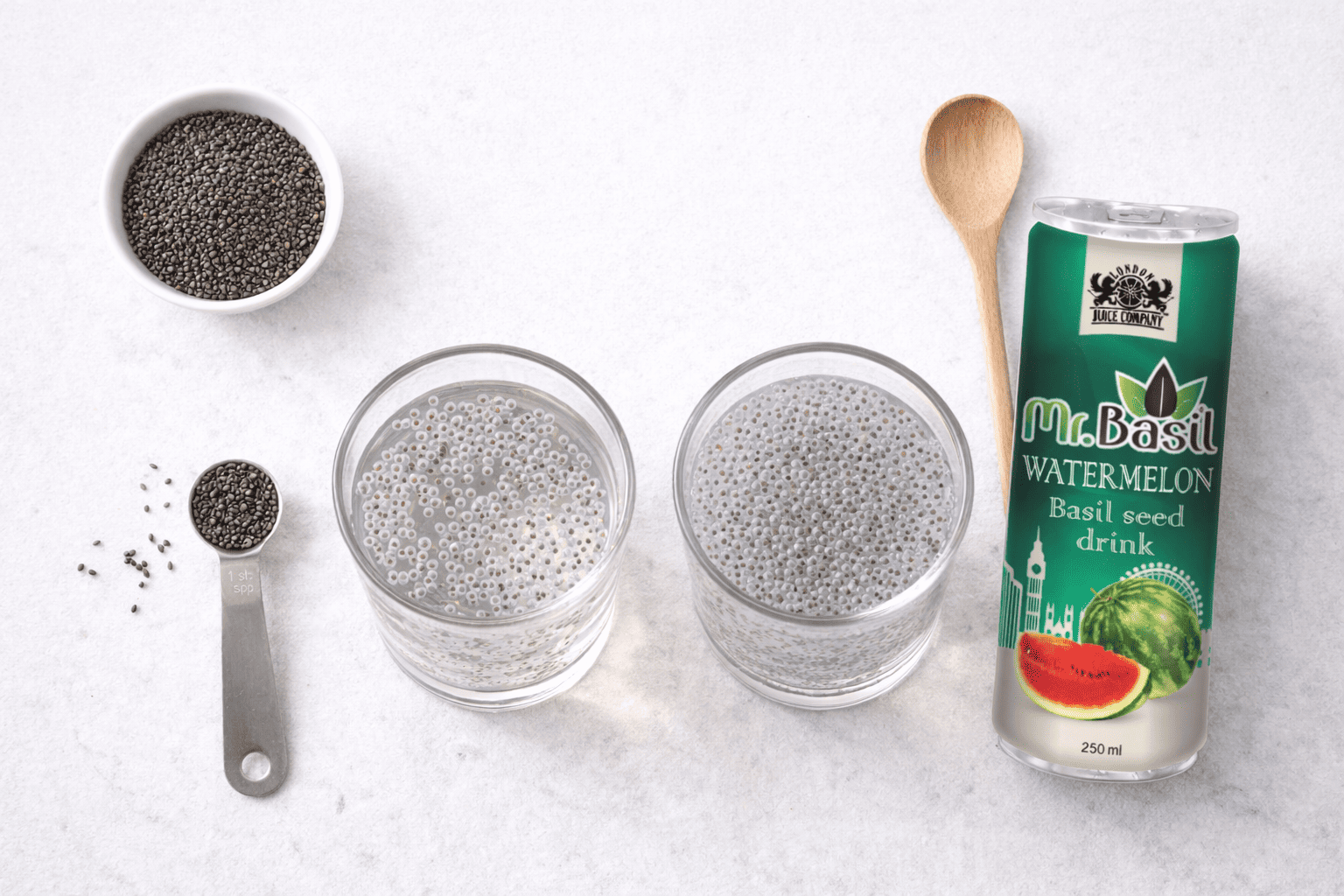 How to soak basil seeds in water correctly shown with a glass and measuring spoon